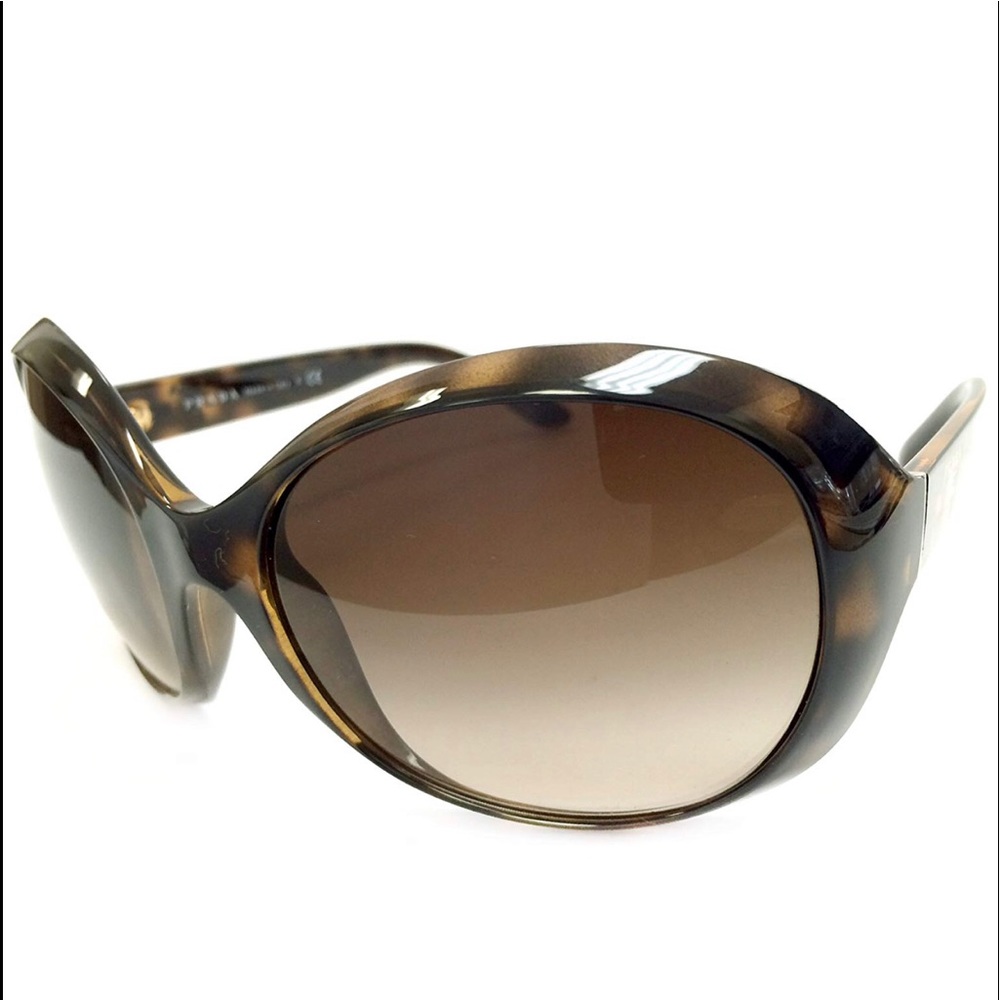 PRADA SPR 04O SUNGLASSES. COLOR 2AU-6S1.